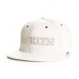 Trendy flat brimmed hat leather brooklynletter