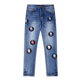 Amiri Jeans Blue Ripped Letter Embroidered Jeans