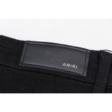 Amiri Jeans Slim Fit Stretch Ripped Jeans