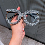 Trendy punk glasses full of diamonds