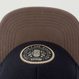 Trendy flat brimmed hat woolen woven label