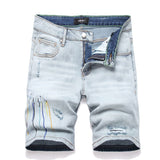 Amiri Jeans Ripped Denim Shorts