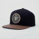 Trendy flat brimmed hat woolen woven label