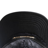 Trendy flat brimmed hat metal inlay