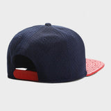 Trendy flat brimmed hat embroider la creme breathable mesh