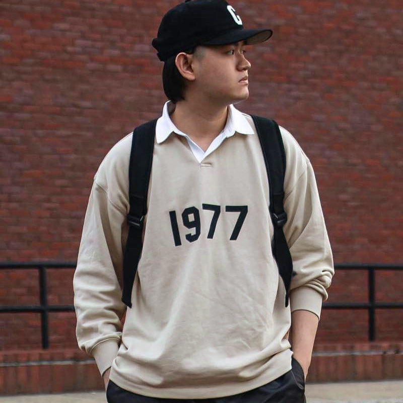 Fear of God Essentials 1977 Rugby Wheat Printed Long-Sleeved Polo Shirt