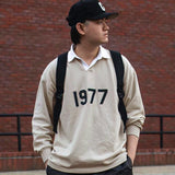 Fear of God Essentials 1977 Rugby Wheat Printed Long-Sleeved Polo Shirt