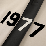 Fear of God Essentials 1977 Rugby Wheat Printed Long-Sleeved Polo Shirt